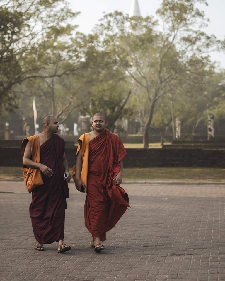 Two Buddhist monks walking